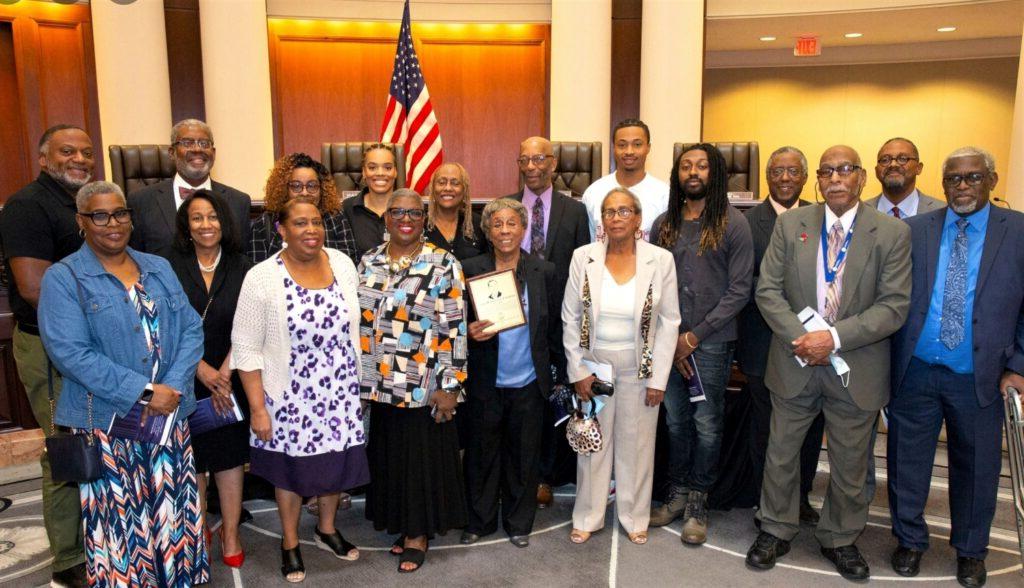 Descendants of Arthur Alexander Madison holding the induction plaque for the Alabama Lawyers Hall of Fame. Inductees must have practiced law and lived in Alabama, and have died at least two years before being nominated. Relatives or friends of the nominee must submit a package describing the person’s suitable education, character, career, ethical behavior and accomplishments.